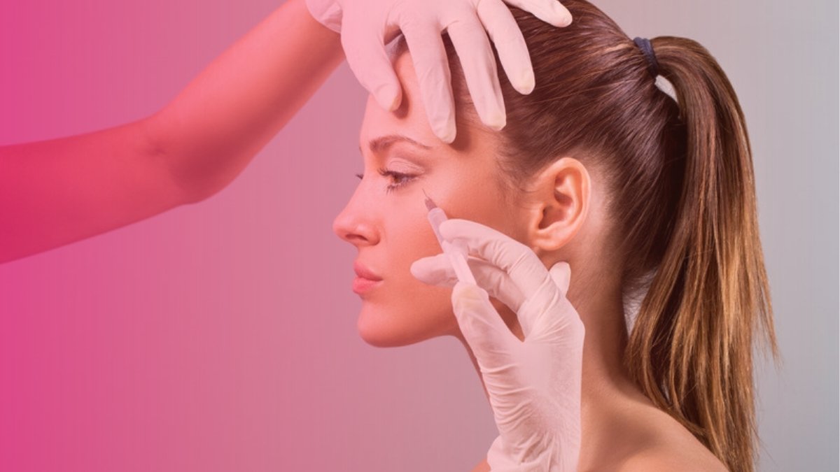 A patient receives a Botox injection from a gloved provider, with a pink gradient overlay in Get Clear Beauty brand colors.